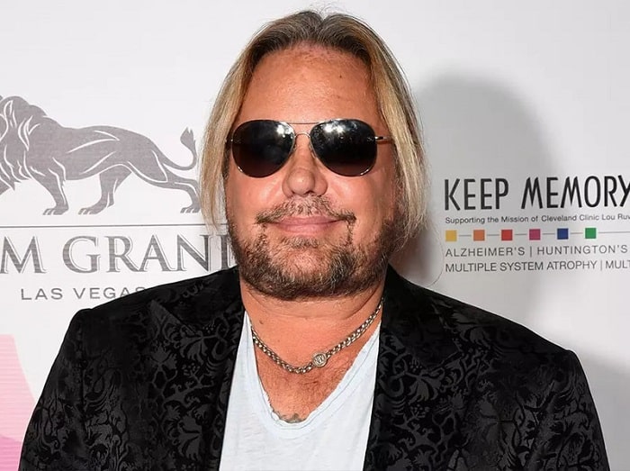 Elizabeth's rich father, Vince Neil.